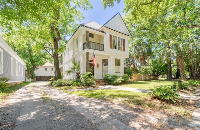 1703 Dauphin St, Mobile, AL 36604 - view of front of house with driveway and a balcony