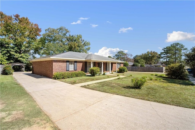 ranch-style home with a front yard