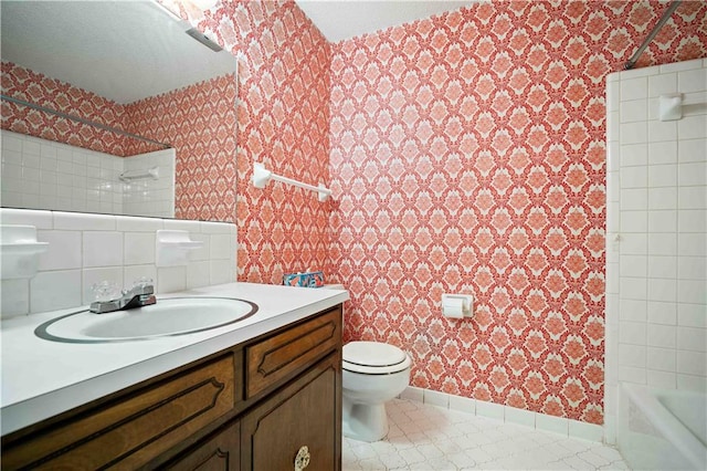 full bathroom with vanity, toilet, tile patterned floors, and tiled shower / bath