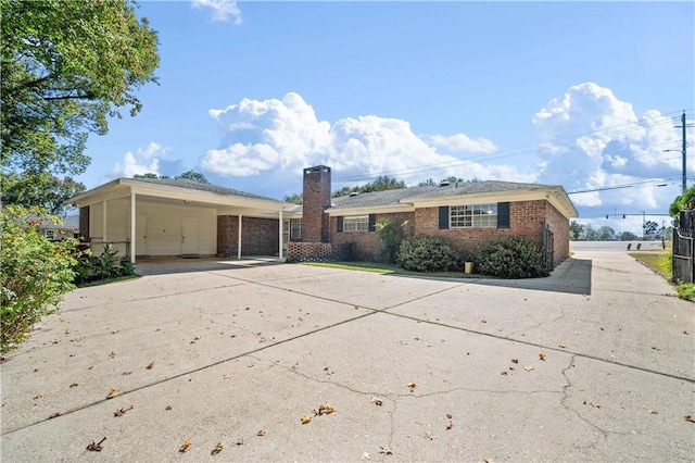 view of front of house featuring a carport