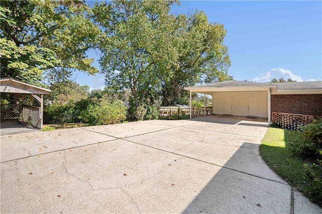 view of patio / terrace with a carport