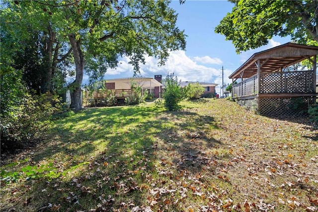 view of yard with a deck