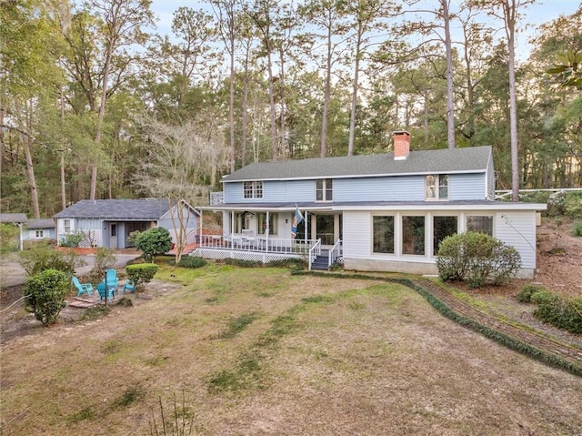 back of house with a porch