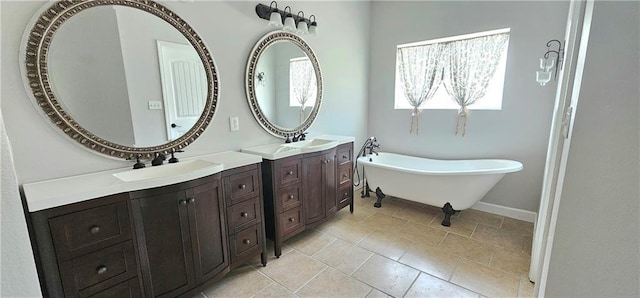 bathroom with vanity and a bathing tub