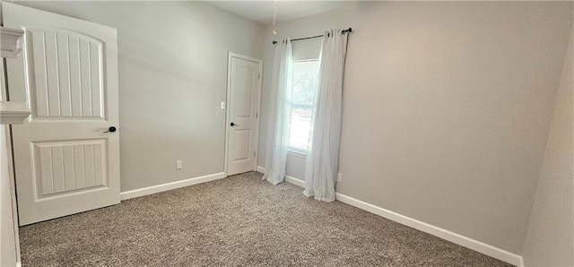 unfurnished bedroom featuring light colored carpet