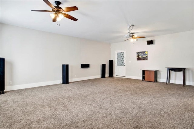 unfurnished living room featuring carpet floors and ceiling fan