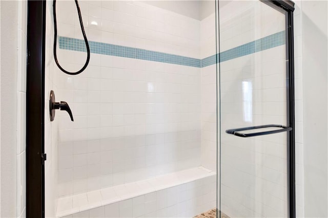 bathroom featuring an enclosed shower