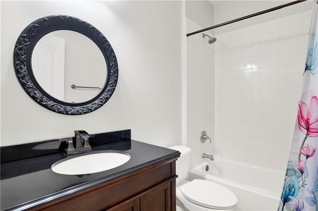 full bathroom featuring toilet, shower / tub combo, and vanity