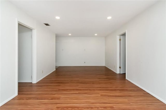 unfurnished room featuring light hardwood / wood-style flooring