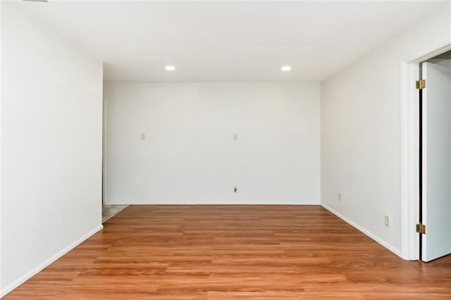 unfurnished room featuring light hardwood / wood-style flooring