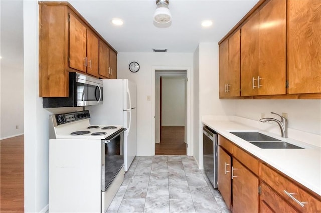 kitchen featuring sink and appliances with stainless steel finishes