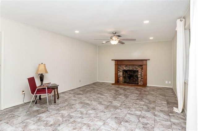 unfurnished living room with a brick fireplace and ceiling fan