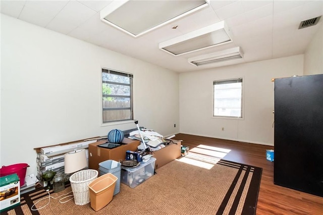 spare room with dark wood-type flooring