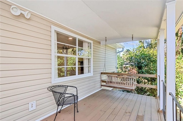 wooden deck featuring a porch