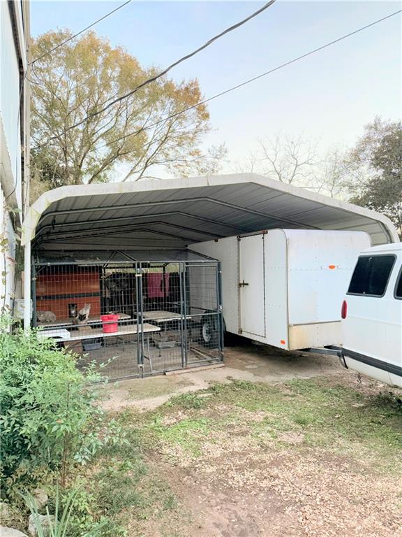 view of car parking featuring a carport