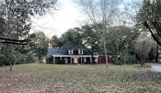 view of front of home with a front yard