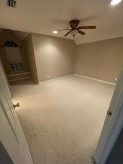 unfurnished room with visible vents, baseboards, carpet flooring, and a ceiling fan