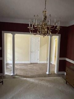 unfurnished dining area with a chandelier