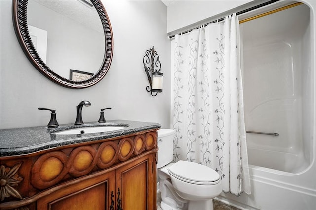 full bath featuring shower / tub combo, toilet, and vanity