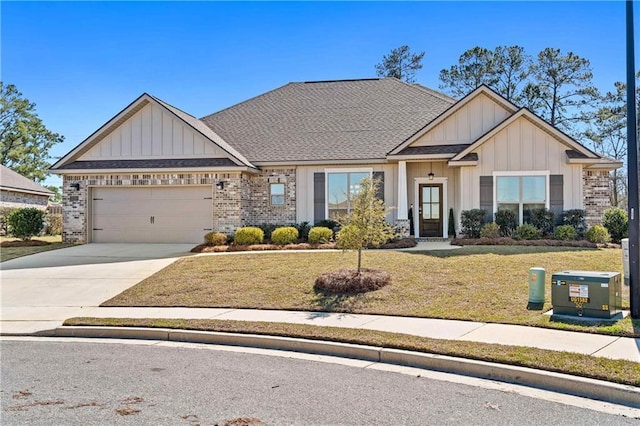 craftsman-style home featuring a garage, driveway, brick siding, and a front yard