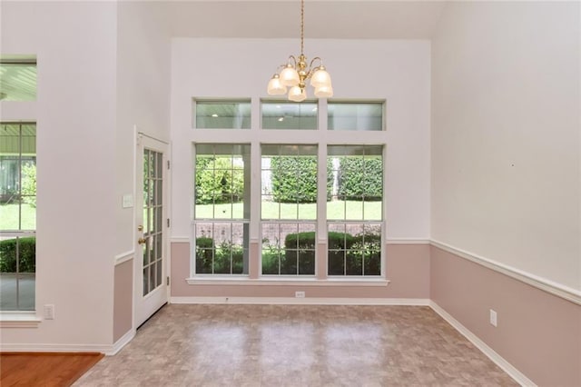 1056 Cross Gates Pl, Mobile, AL 36609 - unfurnished dining area with a chandelier and plenty of natural light