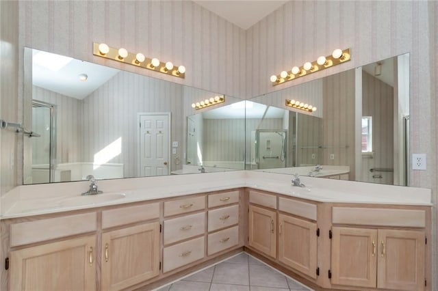 1056 Cross Gates Pl, Mobile, AL 36609 - bathroom featuring wallpapered walls, double vanity, and tile patterned floors