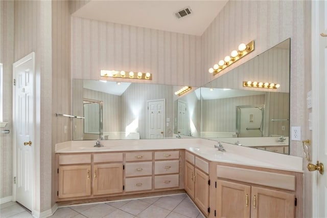 1056 Cross Gates Pl, Mobile, AL 36609 - full bath featuring wallpapered walls, double vanity, and tile patterned flooring