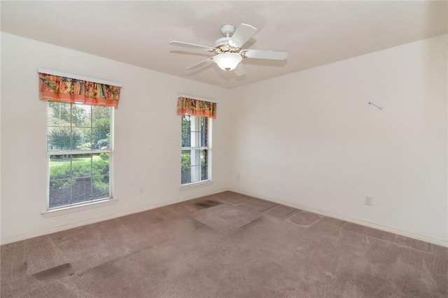 1056 Cross Gates Pl, Mobile, AL 36609 - carpeted empty room featuring healthy amount of natural light and a ceiling fan