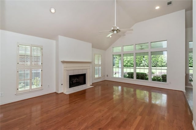 1056 Cross Gates Pl, Mobile, AL 36609 - unfurnished living room with plenty of natural light, a ceiling fan, wood finished floors, high vaulted ceiling, and recessed lighting