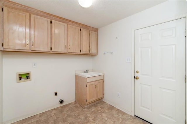 1056 Cross Gates Pl, Mobile, AL 36609 - washroom with cabinet space, washer hookup, hookup for an electric dryer, light floors, and a textured ceiling
