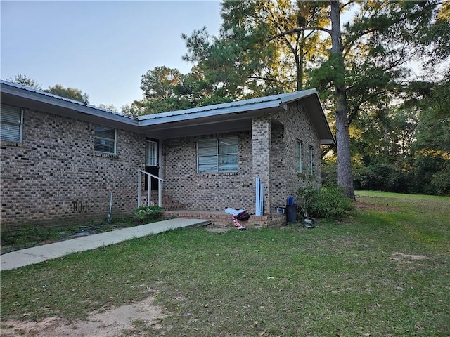 exterior space with a lawn