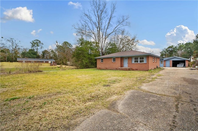 view of side of home featuring a yard