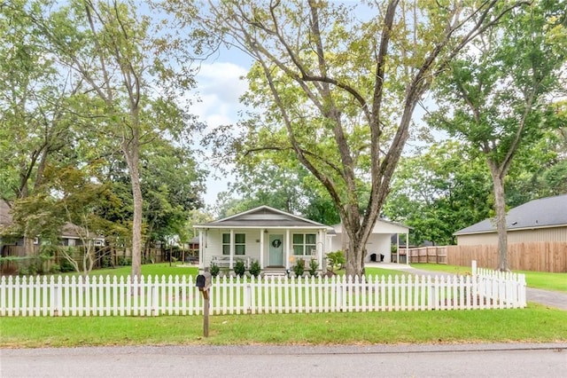 ranch-style home with a front lawn