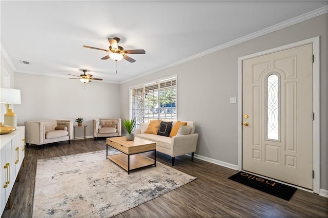 living room with ornamental molding, dark wood finished floors, visible vents, and baseboards