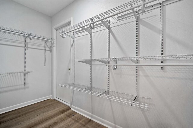 709 Oak Field Dr, Mobile, AL 36609 - spacious closet featuring wood finished floors