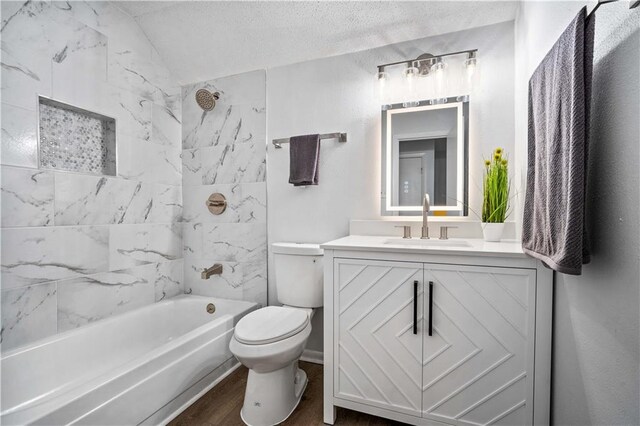 709 Oak Field Dr, Mobile, AL 36609 - full bathroom with toilet, shower / bathtub combination, vanity, wood finished floors, and a textured ceiling