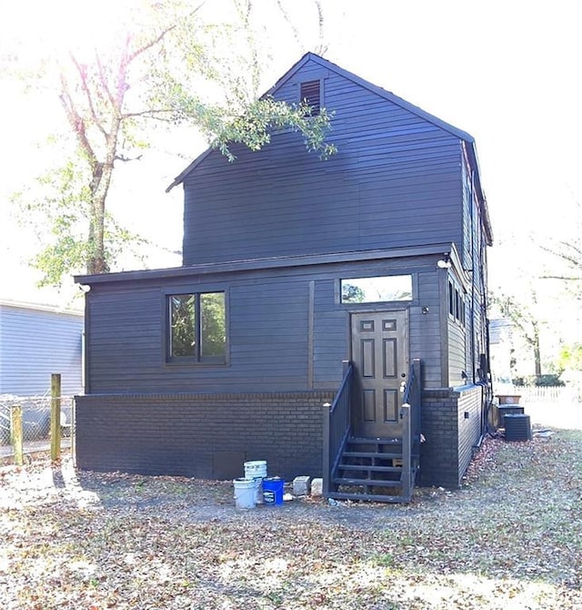 view of front of property with cooling unit