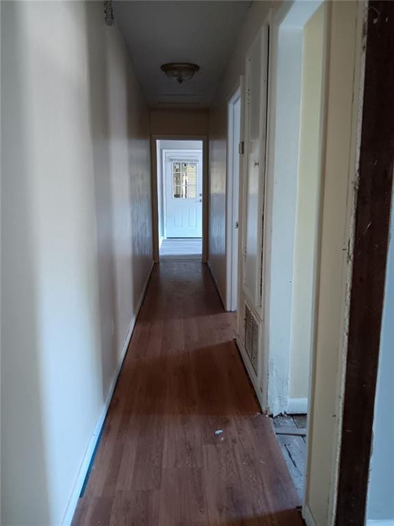 hallway featuring hardwood / wood-style floors