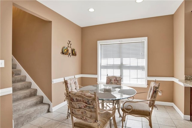 dining space featuring recessed lighting, baseboards, stairs, and light tile patterned floors