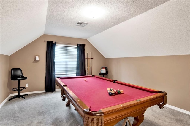 playroom with baseboards, visible vents, lofted ceiling, and carpet