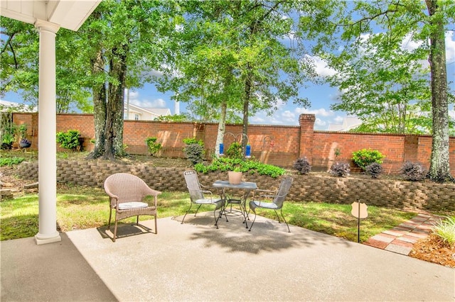 view of patio / terrace featuring a fenced backyard and outdoor dining space