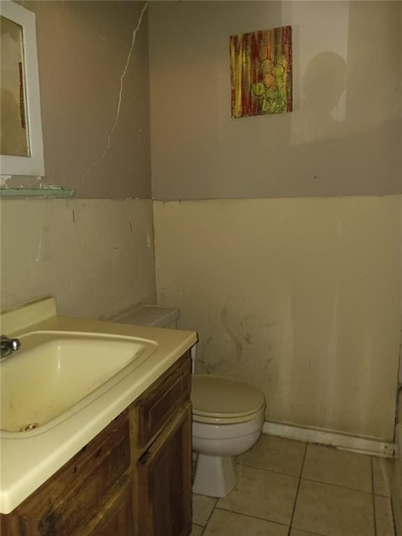1863 Mott Dr N, Mobile, AL 36617 - half bath with tile patterned floors, toilet, and vanity