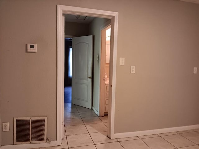 1863 Mott Dr N, Mobile, AL 36617 - corridor featuring light tile patterned floors and baseboards