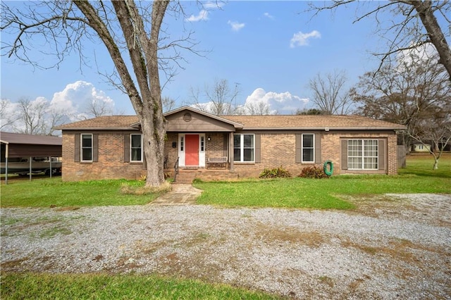 ranch-style house with a front lawn