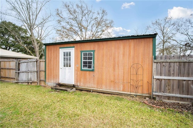 view of outdoor structure featuring a yard