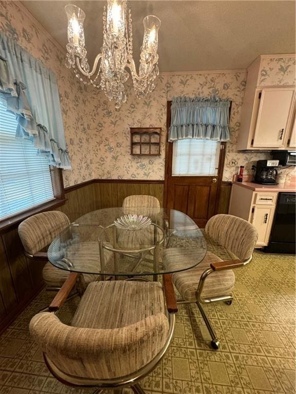 dining space with a chandelier