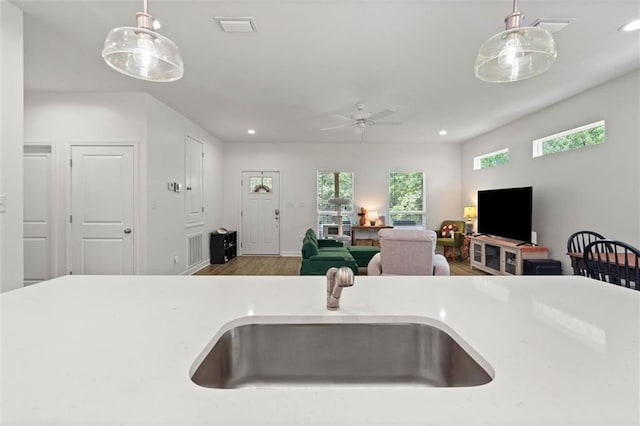 911 Lockenbie Pl, Dauphin Island, AL 36528 - kitchen with plenty of natural light, pendant lighting, light countertops, and recessed lighting