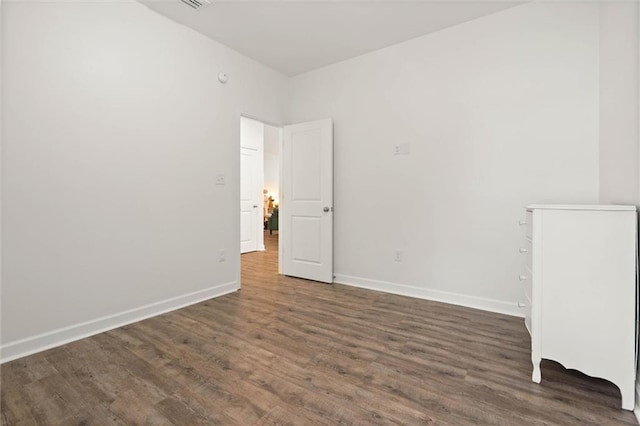 911 Lockenbie Pl, Dauphin Island, AL 36528 - empty room with wood finished floors and baseboards