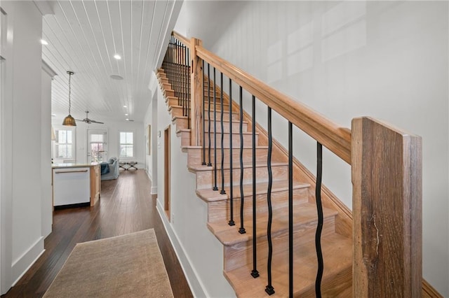 staircase with hardwood / wood-style flooring, recessed lighting, baseboards, and ceiling fan