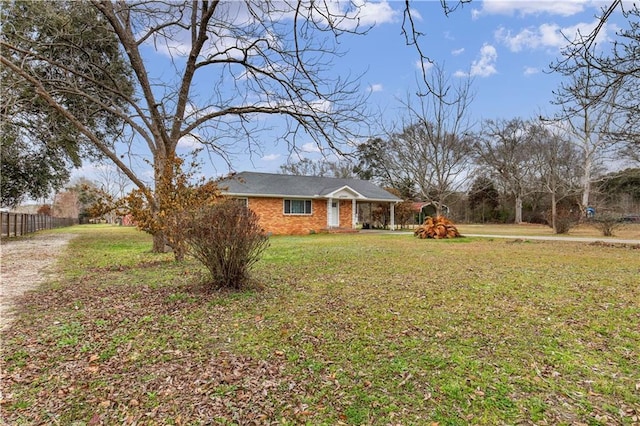 view of front of home with a front yard